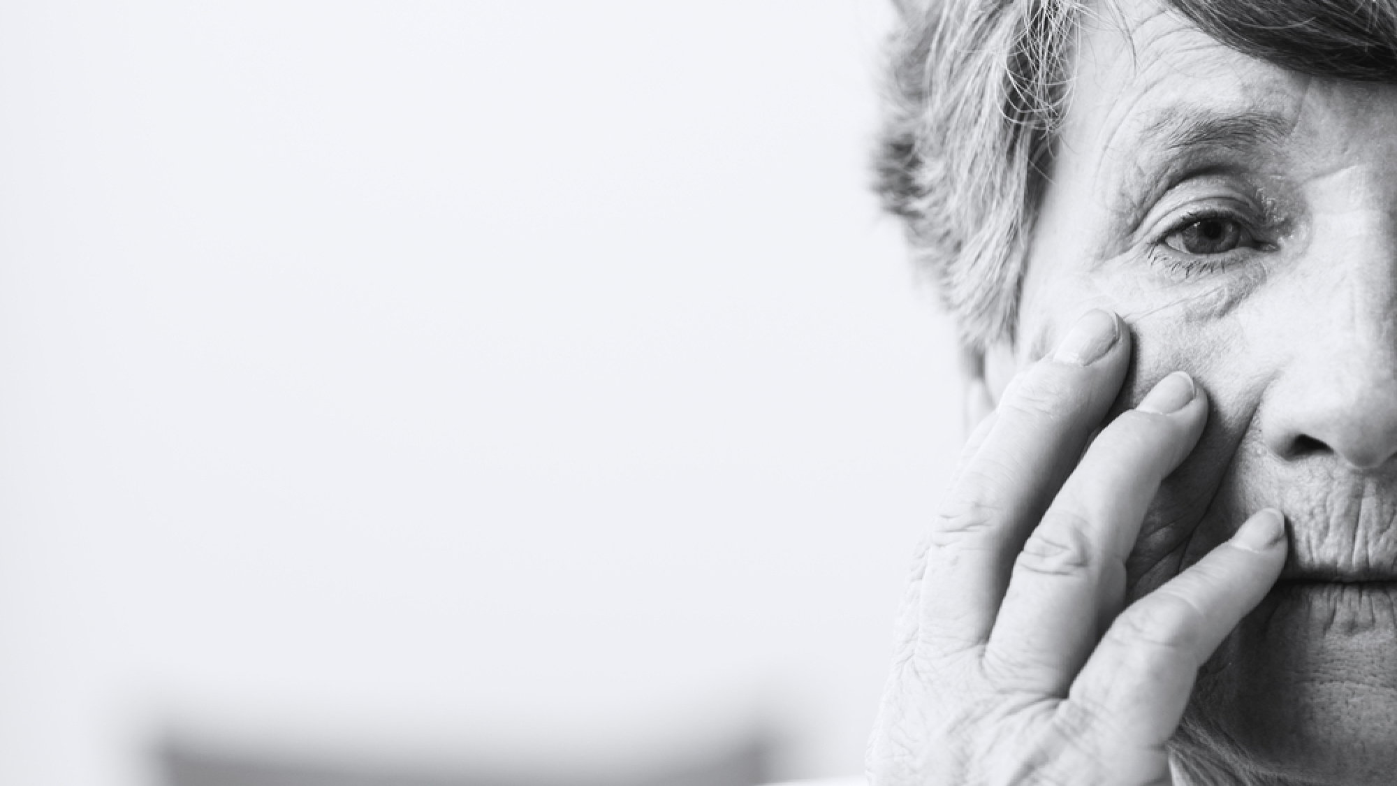 Saddened,And,Afraid,Older,Woman,Is,Touching,Face